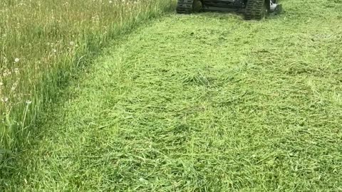 Altoz TRX766 All-Terrain deck mowing a field