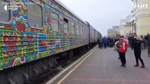 Crowds greet first train from Kyiv to arrive in Kherson since Russians fled