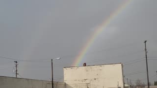 TORRENTIAL RAIN PRODUCES DOUBLE RAINBOW!