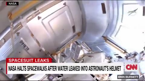 NASA HALTS SPACEWALKS AFTER WATER LEAKED INTO ASTRONAUTS HELMET.
