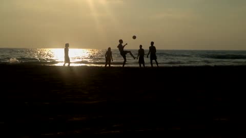 Friends playing ball at sunset [Free Stock Video Footage Clips]