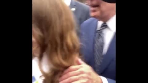 Creepy Joe Biden grabs a young girl by the shoulder and tells her “no serious guys till your 30”