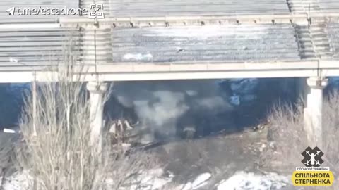Ukrainian Drone Smashes into Russian Tank Under a Bridge