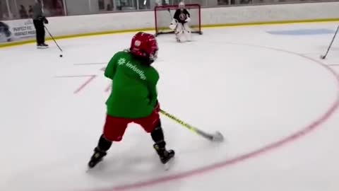 Kid put the spins on the goalie