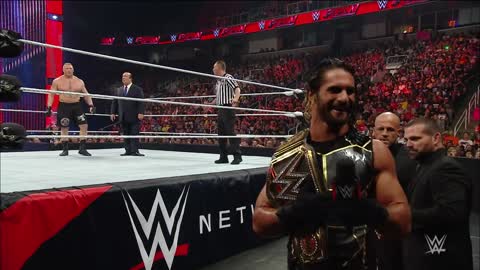 Seth Rollins tries to escape his match with Brock Lesnar