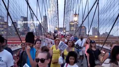 New York teachers march across the Brooklyn Bridge to chants of "f*ck Joe Biden"
