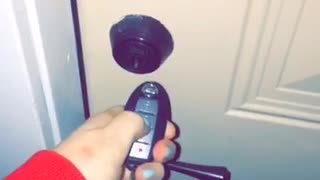 Girl uses car keys to try to get into her house