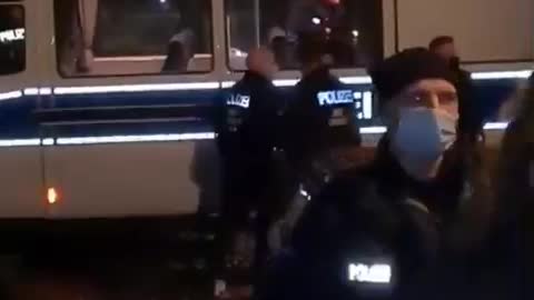 Police BEAT a woman in Berlin