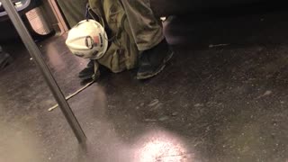 Construction worker clipping finger nails