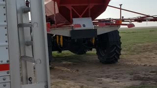 Spreading dry fertilizer