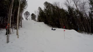 Snowmobile Flipping During Hill Climb