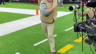 You won't believe this NFL photographer's dance moves!