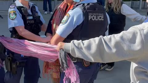 Australia: Protesters Attempt to Prevent Arrest of Peaceful Protesters. police assault unarmed women