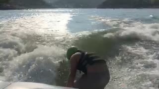 Wake surfing - The Kid makes it look Easy.