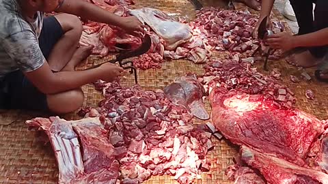 Cow meat cutting in Village