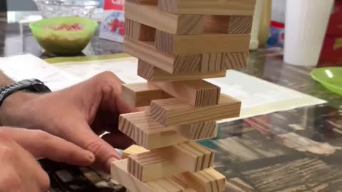 Jenga. Take a block from the bottom and put it on top