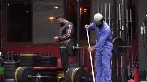 Gym cleaner showing his skills