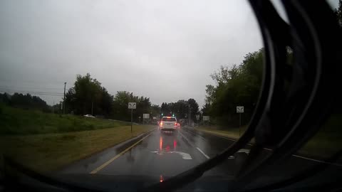 Wet weather highway driving and car decides to run red.