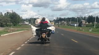 Risky Ride with Wide Load