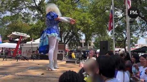 Drag queen takes money from a child and does a suggestive show in San Marcos, Texas.