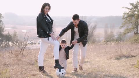 Family enjoying their time outdoors Stock Footage|