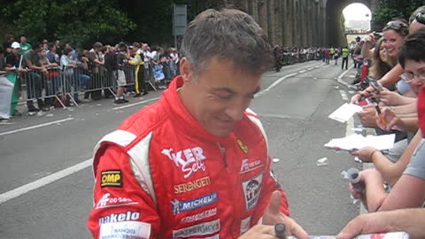 Jean Alesi signs autographs at Le Mans 2010