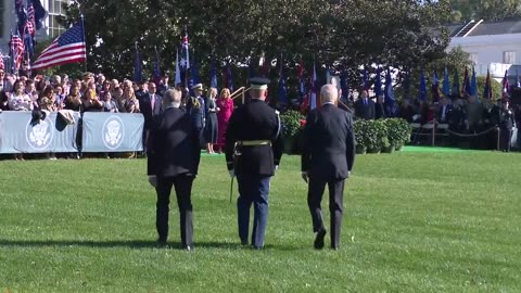 A confused Biden shuffles across the White House lawn with the Australian prime minister