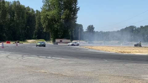 Cars Drifting on a Race Track
