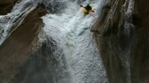 SURREAL KAYAKING OFF A TALL WATERFALL