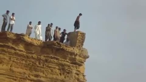 Karachi boys Jumping for swimming from Very High place called Paradise point