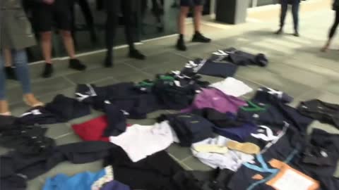 Nurses Turn in Uniforms in front of Parlimament