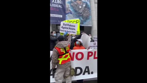 Vancouver, CA - Stop Asian Hate Rally - Security Joins In To Block CCP Sign.