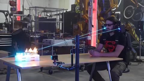 Man's eyes controlling lasers on his shoulders 👀💡 #MindControl #LaserShow #UniqueTalent