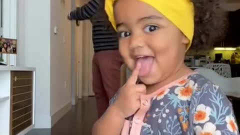 adorably little girl dances with her dad