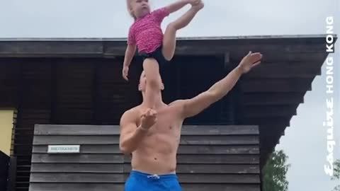 Daddy and baby love to showing their skills together