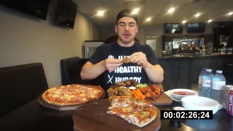 BIG PIZZA AND CHICKEN WING CHALLENGE Gourmet Wood Fired Pizza Man Vs Food