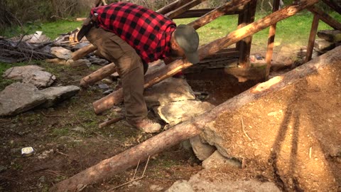 Building a totally secret underground dugout cabin.