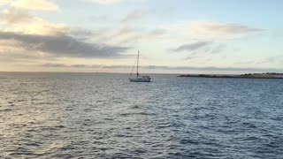 Sailboat leaving Saint Petersburg yacht basin early morning