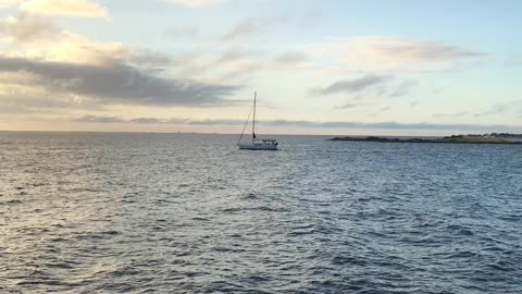 Sailboat leaving Saint Petersburg yacht basin early morning