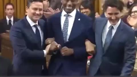 Trudeau gives a wink and bites his tongue at new Speaker of the House of Commons, Greg Fergus.