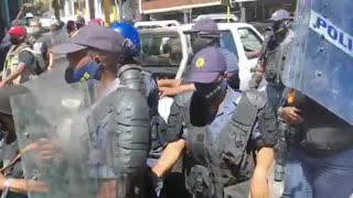 Police pushing SAFTU protesters away from Parliament
