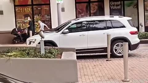 No Hands Driver Crashes into Parked Car