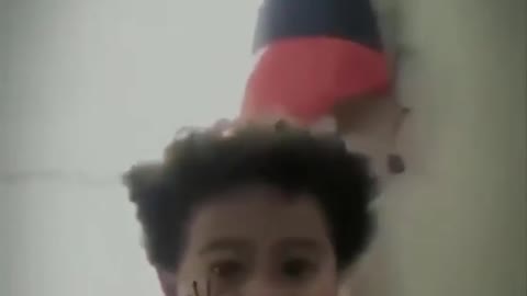 Child With Virtual Spider on His Face