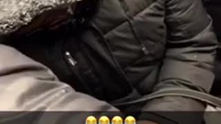 Man sleeps on stranger's shoulder on subway train