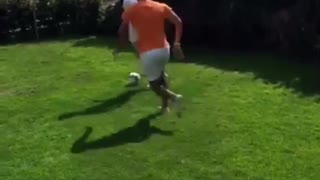 Guy tries kicking soccer ball but falls and knocks down friend