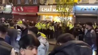 Islamic crowd in London throws objects and forces British police to retreat.