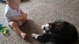 Baby Tries to Lick Toes Like Cat