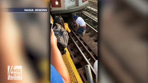 Raw video: Five-year-old girl rescued from the tracks at a Bronx subway station