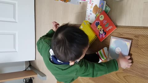 Adorable 11 month old baby Learns To Clean Up After Himself