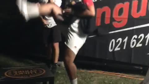 Guy white shirt kicking beer tossed at him in slomo